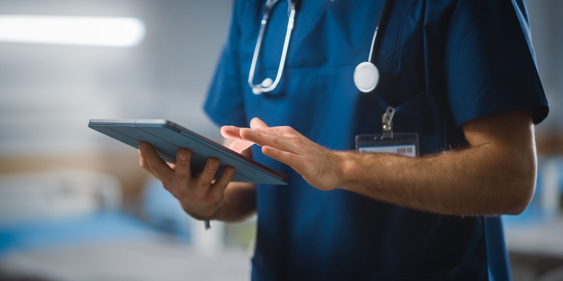 Healthcare worker using a tablet